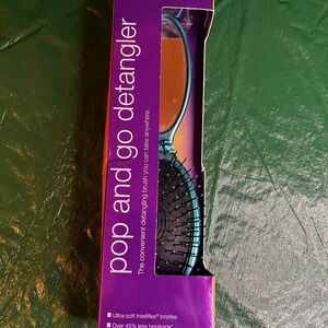 Purple Pop and Go Detangler Brush